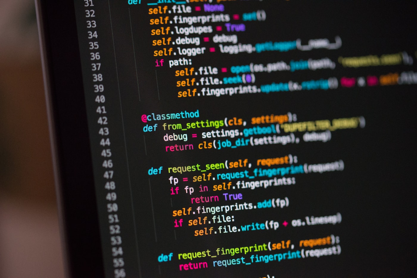 Full-frame close-up of readable code in a focused deployment and command-surface environment.